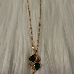Elegant Gold Necklace with Green Pendant